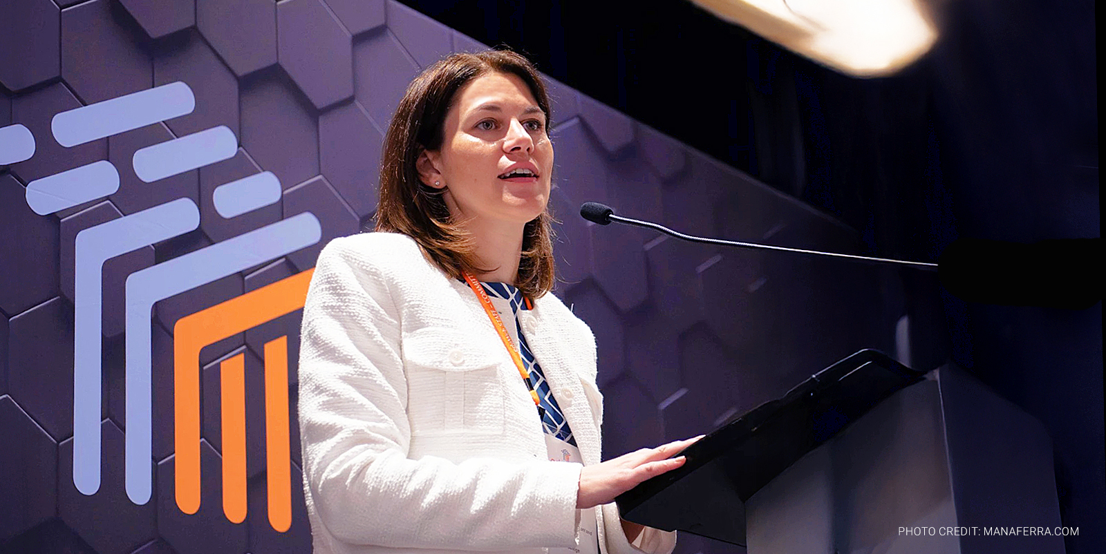 Allison Turcio, higher ed marketing leader speaking on stage